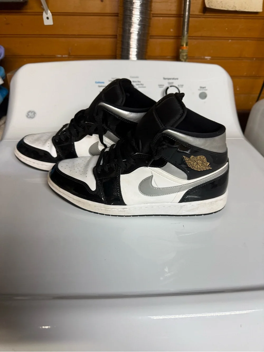 Jordan Black and White Patent Leather High-Top Sneakers